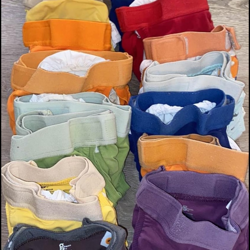 14 Medium G diapers with liners